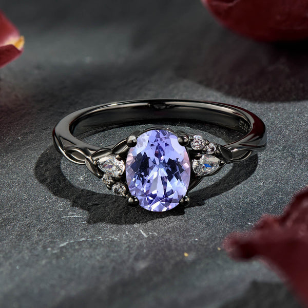 Twilight Radiance Oval Cut Tanzanite Black Gold Modern Elegant Statement Engagement Ring