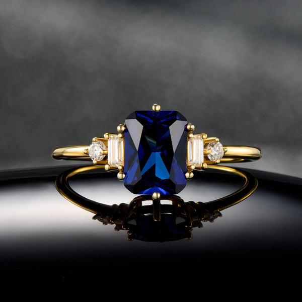 Elegant Cushion Cut Sapphire Ring in Gold Symmetrical Side Stone Style Statement Engagement Ring