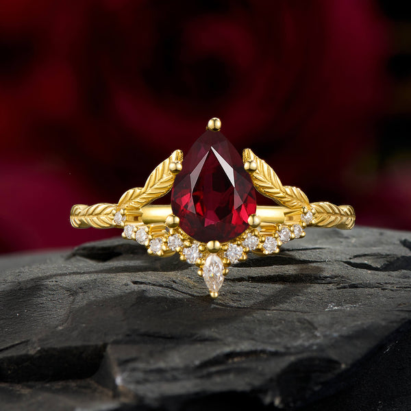 Crimson Reverie Pear Cut Ruby Ring Gold Botanical Sculptural Engagement Ring